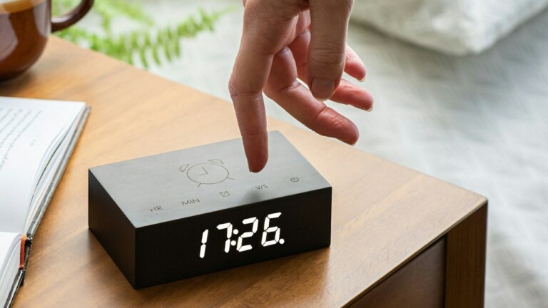 Gingko Flip Click Clock minimal alarm clock has engraved buttons and a digital display